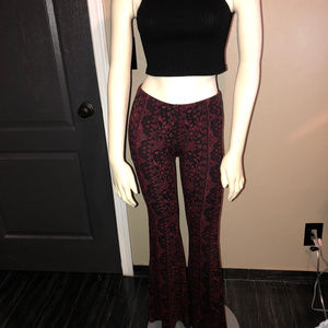 Burgundy and black floral pattern pants